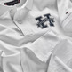 POLO DE CORTE REGULAR CON INICIAL NIÑO TOMMY HILFIGER